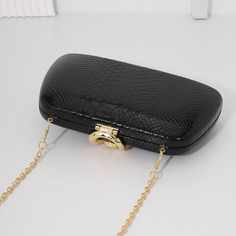 Sac de soirée élégant à imprimé serpent et au style sophistiqué